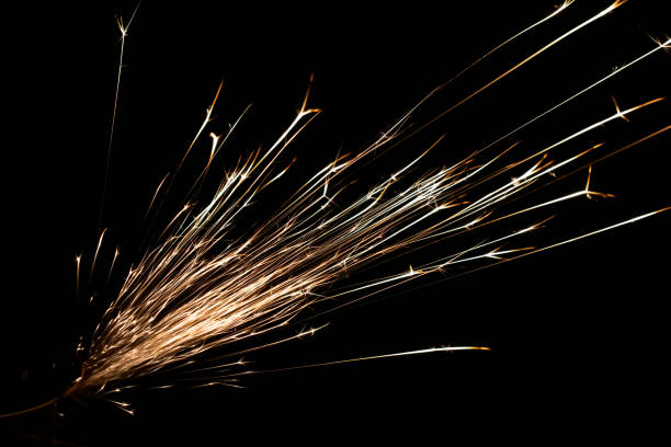 istock sparks from the grinder glowing in the dark 2164700686