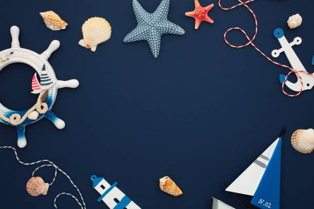 istock Nautical collection featuring seashells, starfish, a ship’s wheel, and a sailboat. Perfect for summer, travel, and marine-themed designs. 2164703286