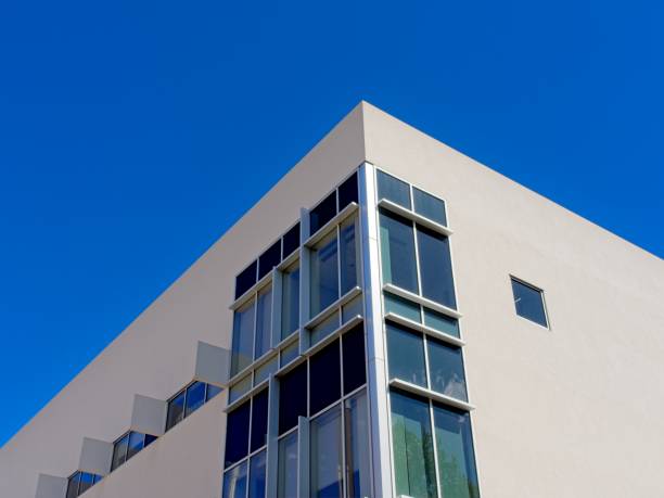 istock Corner of building with glass and stucco 2164704961