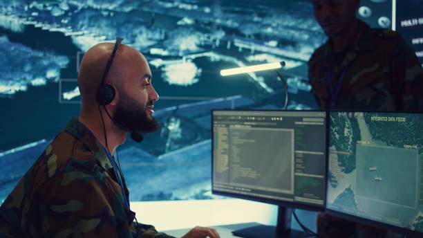 istock Male IT specialist operating on reconnaissance system to transmit real time data 2164705320