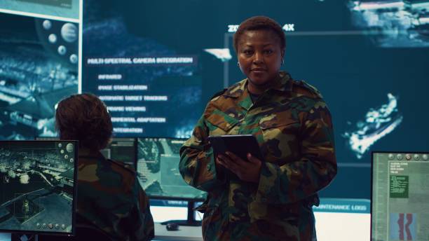 istock Woman sergeant major working on deployment of electronic warfare tools 2164705602