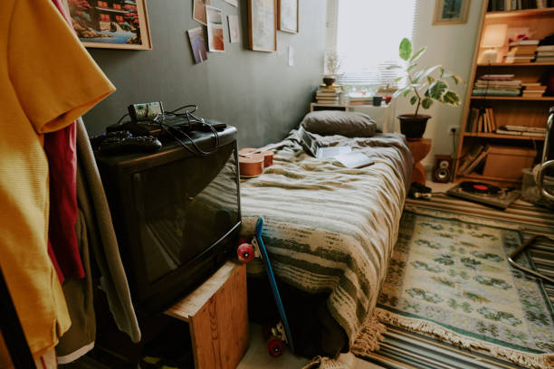 istock Old Fashioned TV Next to Single Bed 2164708482