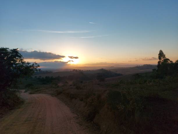 istock Countryside dirt road and sunset 2164710965