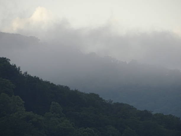 istock Mountain view cloud cover over the city 2164711984