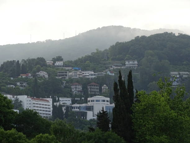 istock Mountain view cloud cover over the city 2164712020