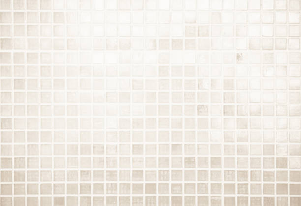 istock Cream light ceramic wall chequered and floor tiles mosaic background in bathroom, kitchen. Design pattern geometric with grid wallpaper texture decoration pool. Simple seamless abstract surface clean. 2164712476