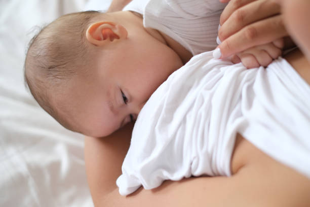 istock Newborn Baby Sleeping After Breastfeeding 2164713093