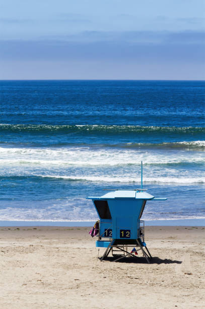 Empty Blue Lifegaurd Station On Empty Sandy Beach California With Ocean And Sky