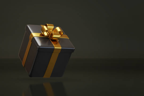 istock Gift box with golden bow on a black background with copy space. 3d illustration. 2164718444