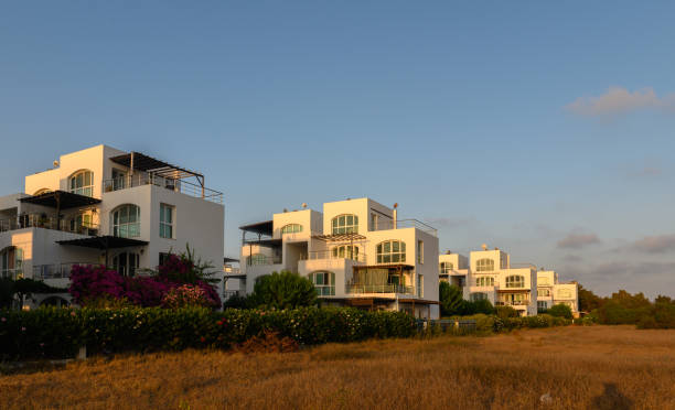 istock beach promenade, white hotel and apartment complex 2164720794