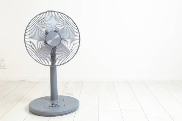 istock Electric fan in a white room 2164723884