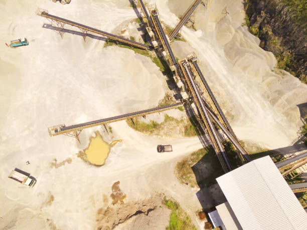 istock Top view of five conveyor belt lines in sand mining 2164725024