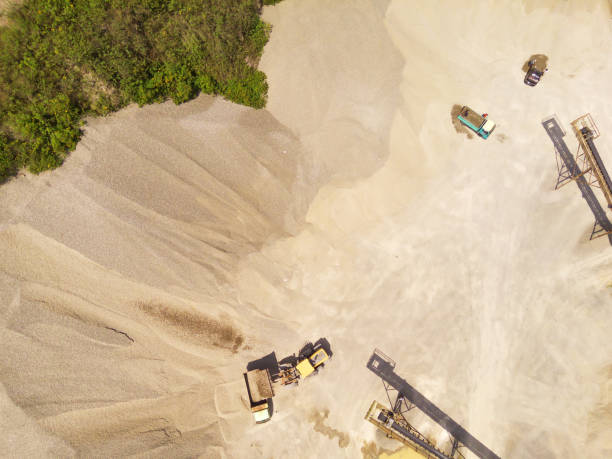 istock Truck and conveyor belt on sand pit 2164725065