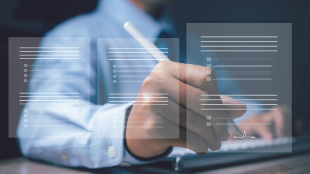 istock Electronic signature. Businessman uses a pen sign electronic documents on a virtual screen. Online business contract, e-signature, digital document management. E-sign business contract concept. 2164727210