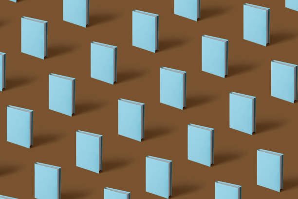 Pattern of blue books on a brown background with soft shadow, copy space. Study, education and Book Lovers Day concept