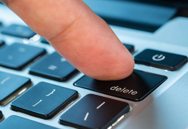 istock Finger of the computer user, he presses the delete button on the computer keyboard. 2164733784
