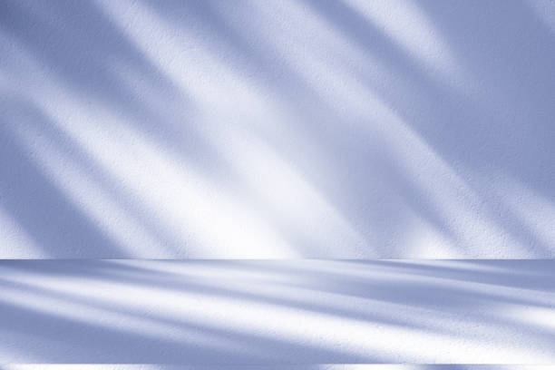 istock Studio style background wall decoration presentation uses white and blue tones. with shadows cast from a nearby window, concept creating a decorative 2164733864