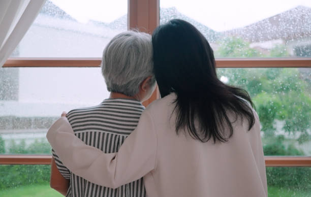 istock Daughter hugging her mother 2164733938