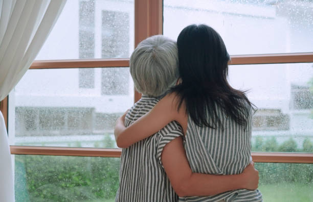 istock Daughter hugging her mother 2164733951
