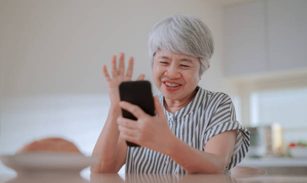 istock Mother having video call with her daughter 2164734488