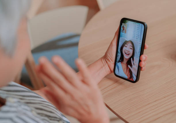 istock Mother having video call with her daughter 2164735050