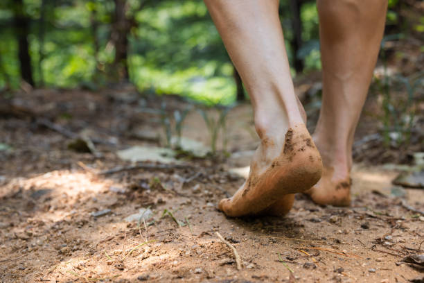 Walking earthing with red clay for health