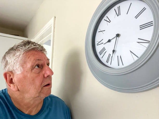istock Senior Caucasian man peering around doorway 2164741309