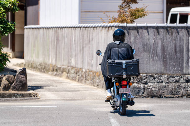 istock Japanese monk riding a motorcycle 2164741907