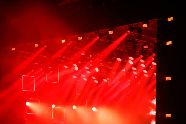 istock Red-orange color on stage at a concert 2164743133