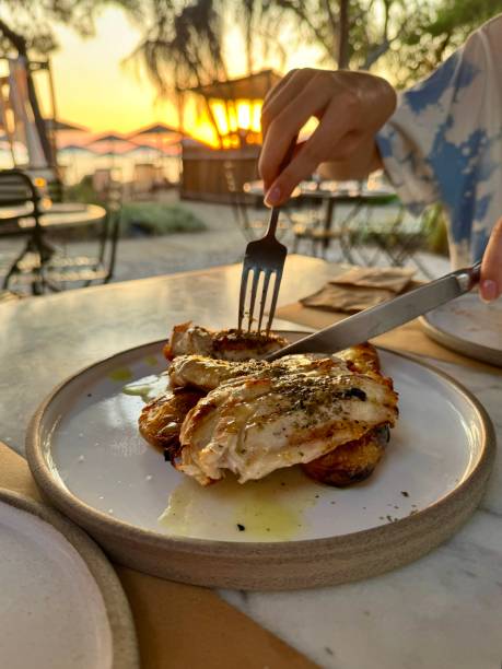 The fried chicken at beach bar at sunset