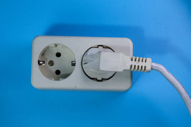top view of white socket on blue background,