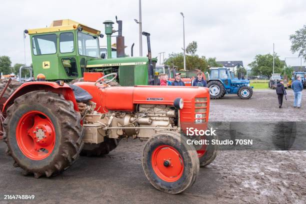 Classic Zetor 4011 And John Deere 7520 Tractors Stock Photo - Download Image Now - Agricultural Machinery, Agriculture, Antique
