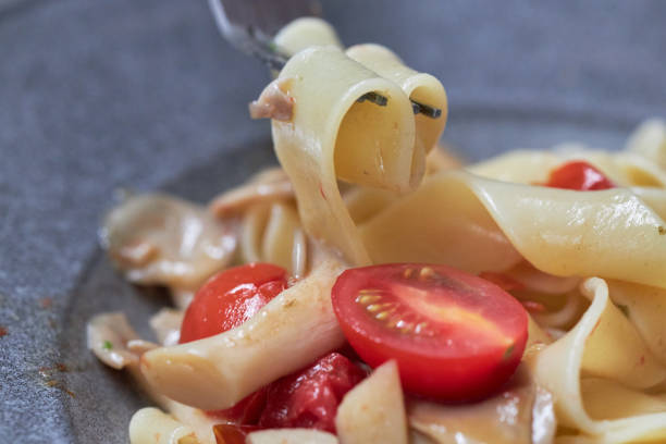homemade pasta, cooked with cherry tomato and mushroom