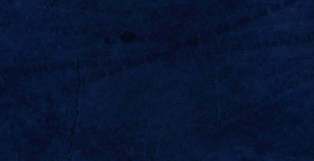 istock Dark rough cement wall background for graphic design 2164751024