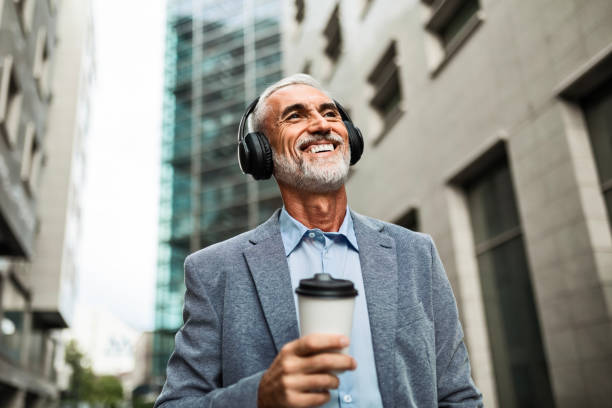 istock Businessman Relaxing with Headphones 2164751187