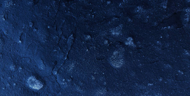 istock Dark rough cement wall background for graphic design 2164751203
