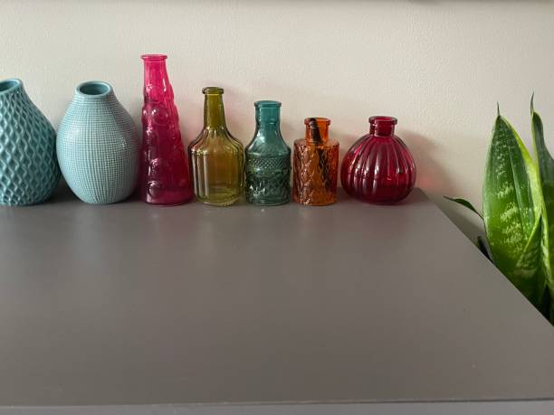 istock Glass bottles colours themes plant 2164754045