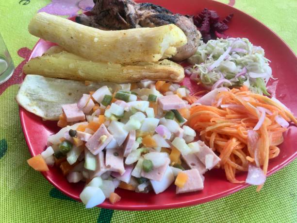 istock Colorful Plate with Fried Cassava, Grilled Chicken, and Various Salads 2164755458