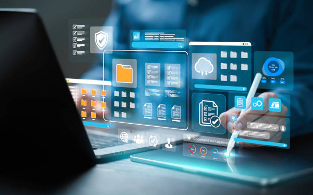 istock Document management digital file information storage of business. Businessman using a computer to online documentation technology database, ERP system, checklist security, file access, doc sharing. 2164759317