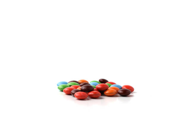istock candy milk chocolate, colorful chocolate candy, isolated on a white background, good for article 2164760318