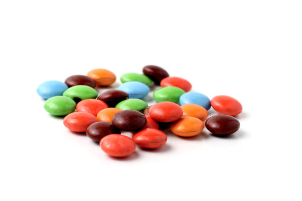 candy milk chocolate, colorful chocolate candy, isolated on a white background, good for article