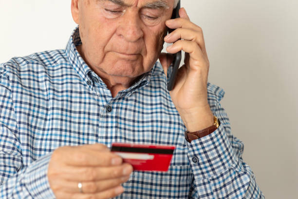 istock Senior Man With Credit Card 2164761846