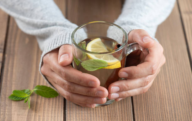 istock Woman with Herbal Tea 2164763101