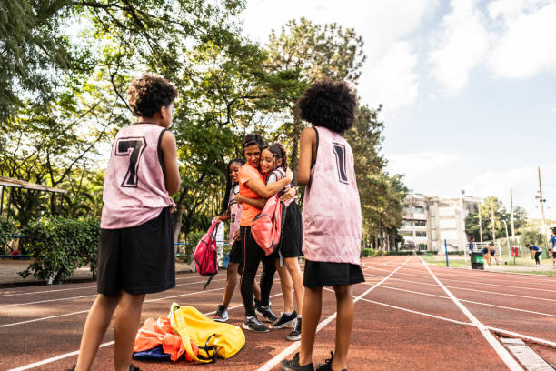 istock Instructor greeting athlete that arrived on a running track 2164766862