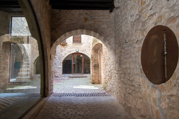 istock Historic courtyard through stone arch in Girona 2164766939