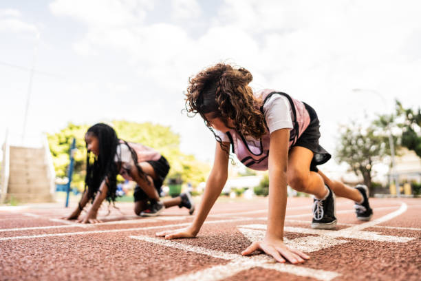 istock Athlete girl practicing on a running track 2164767083