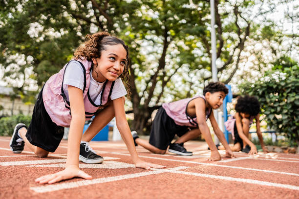 istock Athlete girl practicing on a running track 2164767091