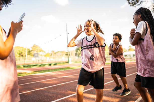 istock Child athletes having fun on the running track 2164767267