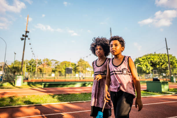 istock Athlete boys walking on a running track 2164767831
