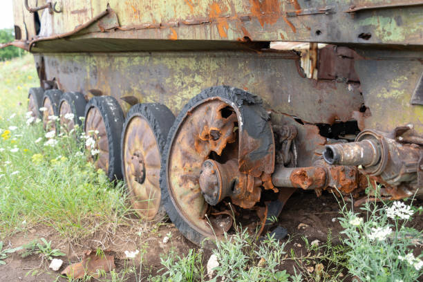 istock Rusty old soviet military vehicle wreck wheels in a field 2164769964